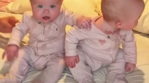 baby twins learn how to sit down