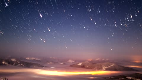 Impressive meteor shower seen from a mountain