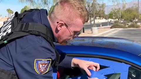 Police officer uses tape to open window!