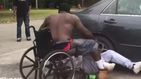 Man gets beat up bad by a dude in a wheelchair