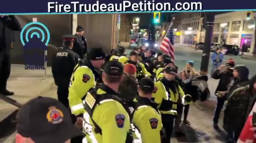 Justin Trudeau gets chased down the street by a protesters in Hamilton, Ontario