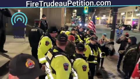 Justin Trudeau gets chased down the street by a protesters in Hamilton, Ontario