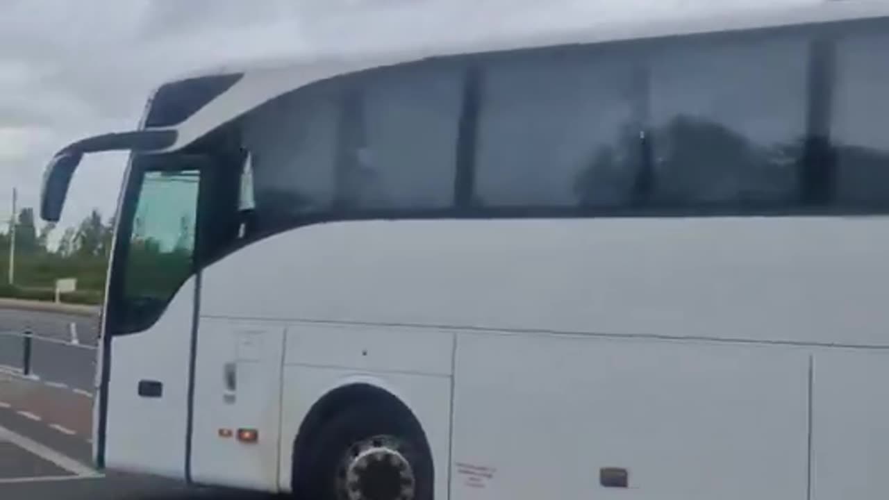 2 bus loads of foreign men being escorted into Ballyogan IPAS centre this