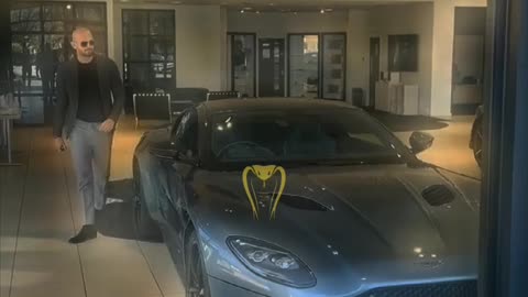 Tate Buys $500k Aston Martin