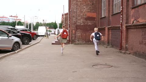 Sibling Dash: Brother and Sister Running to School