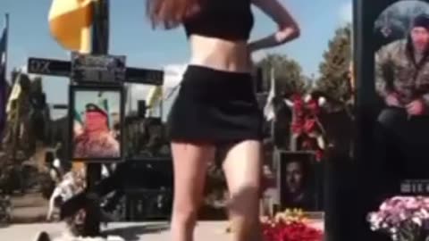 Ukrainian girls dance on the graves of the Ukrainian armed forces.