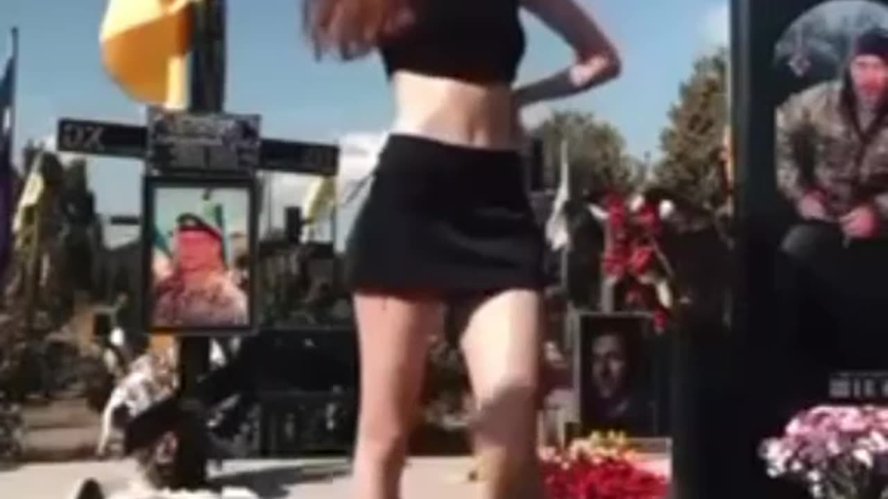 Ukrainian girls dance on the graves of the Ukrainian armed forces.