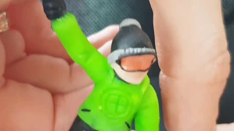 A snowboarder figurine in a New Year's snow ball to order from polymer clay handmade by AnneAlArt