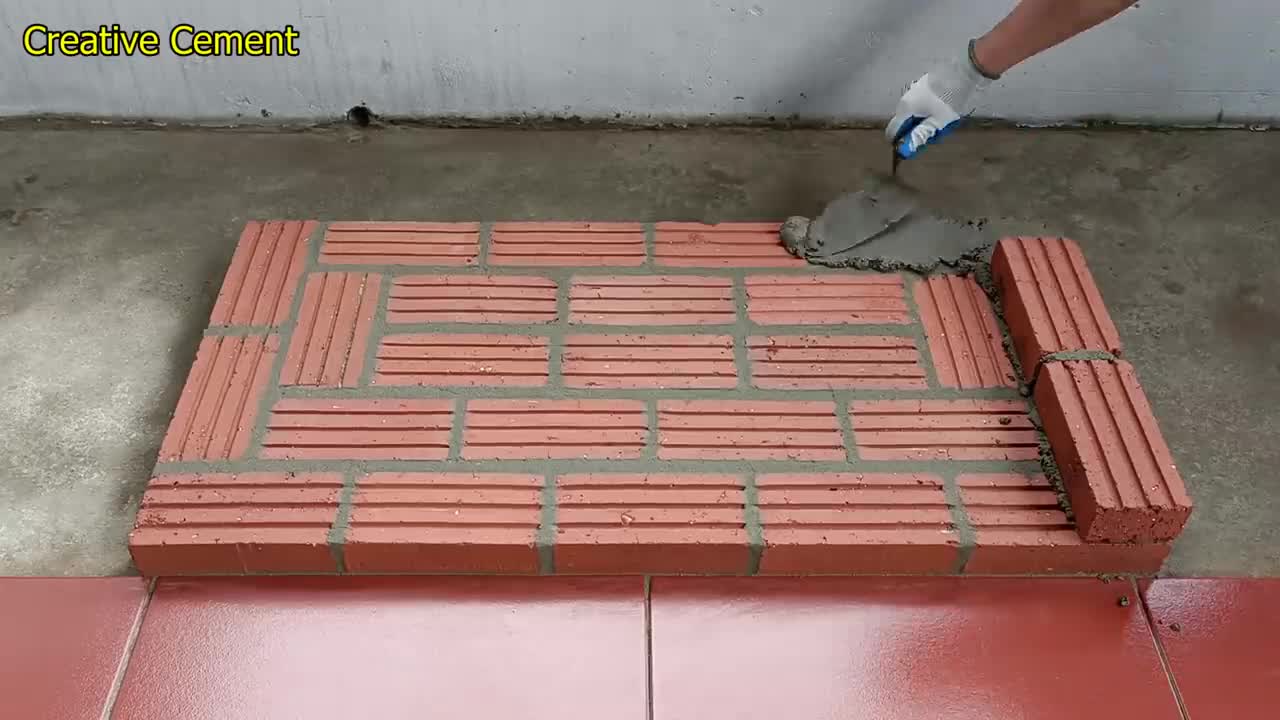 Outdoor wood stove from red brick and cement