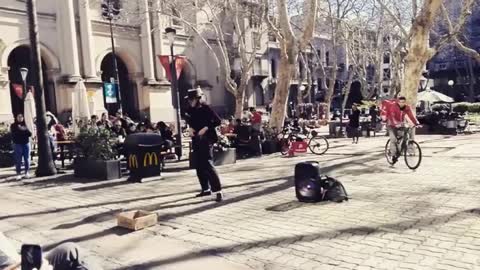 Michael Jackson impersonator dancinc "Smooth criminal" song, Ciudad Vieja, Montevideo