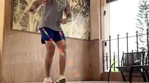 Man Performs Freestyle Rope Jumping
