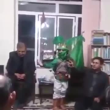 Kid hitting man's head with his toy sword while playing