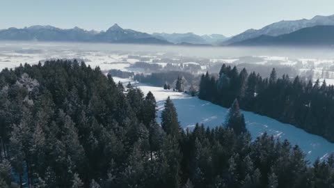 Outdoor aerial photography that takes you into the snow-capped mountains of Colorado, USA.
