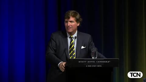 Tucker: Speaks with the Australian media.