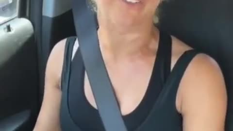 A woman from USA breaks down in her car after being bullied for a pro-life shirt