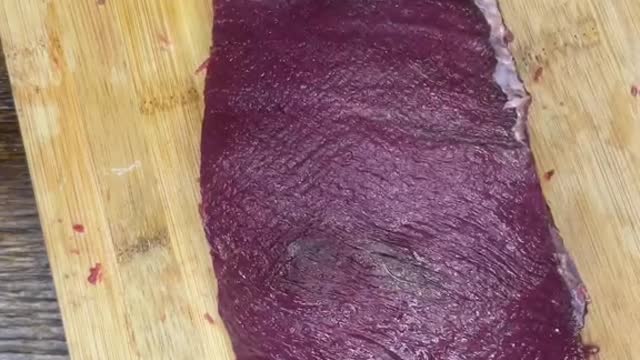 Cleaning up a bottom round roast from a deer