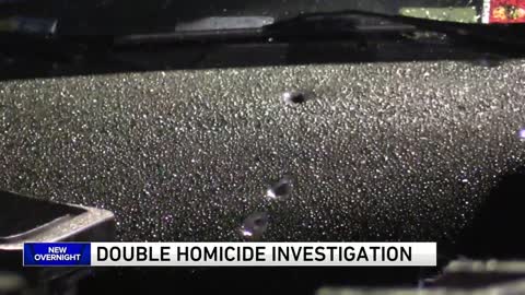 2 shot in head, woman caught in crossfire