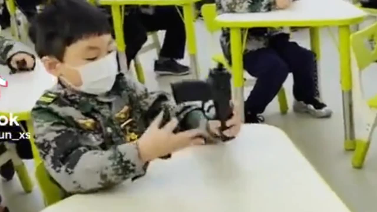 Chinese Children Are Trained up on Weapons