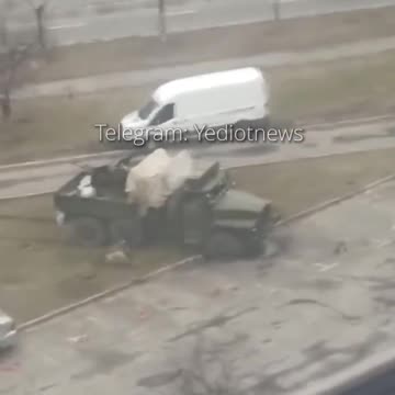 Russian Strela 10 crushes civilian car at Obolon district in Kyiv.