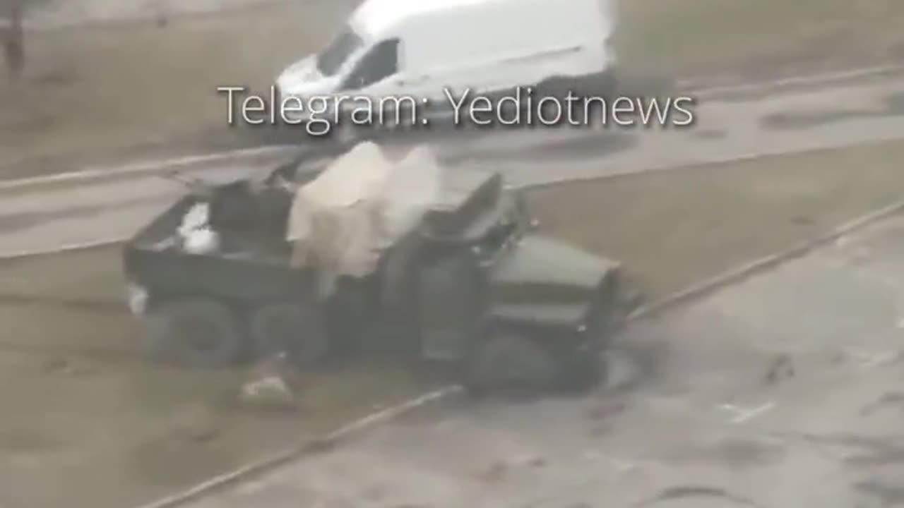 Russian Strela 10 crushes civilian car at Obolon district in Kyiv.