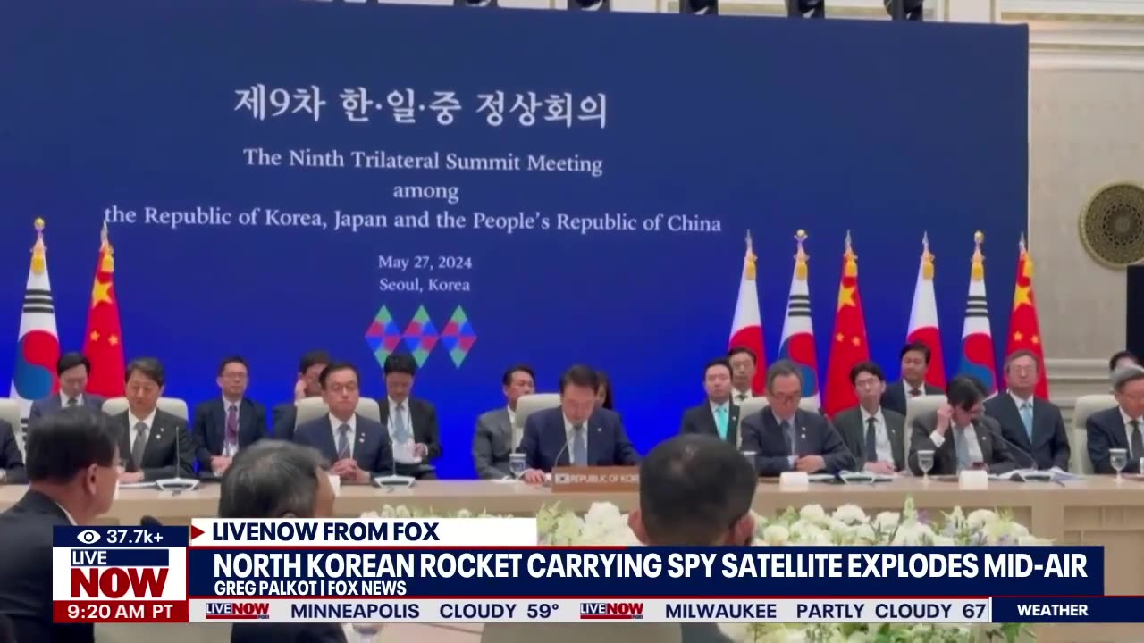 North Korea rocket carrying spy satellite explodes