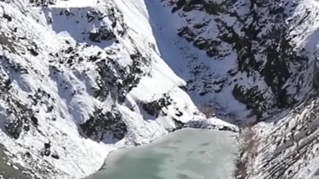 Throwing grenade at a frozen lake