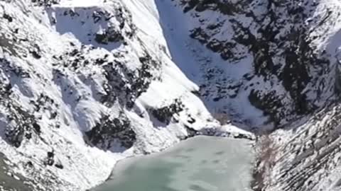 Throwing grenade at a frozen lake