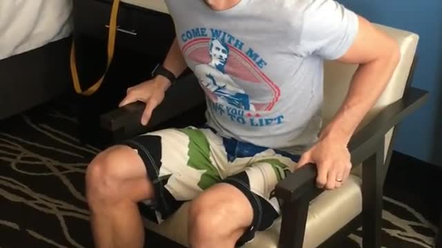 Dom Thorpe demonstrates on YouTube, how to do back exercises like seated back extensions.