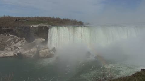 New York Niagara Falls misty view with faint rainbow