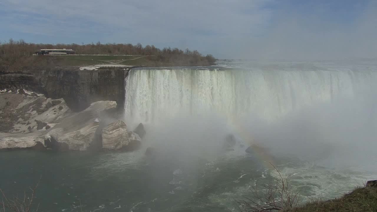 New York Niagara Falls misty view with faint rainbow