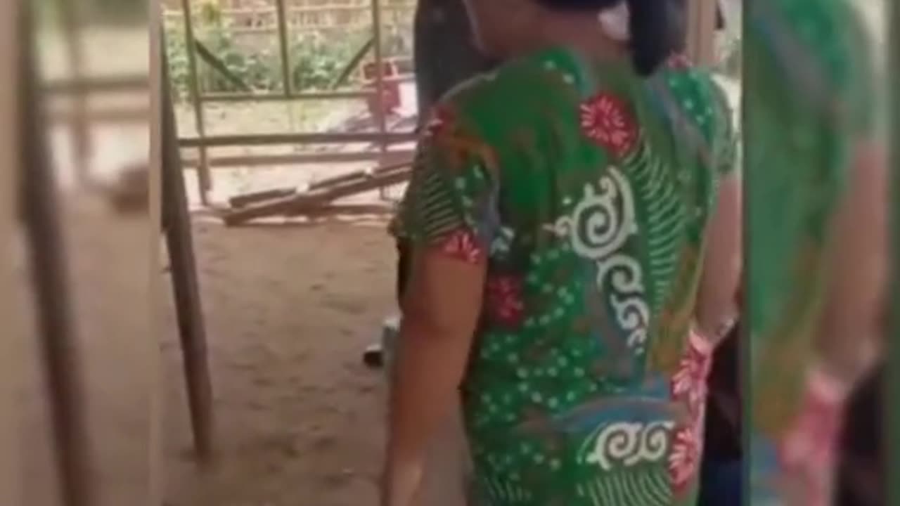 Indonesian woman refuses forced Covid-19 vaccination