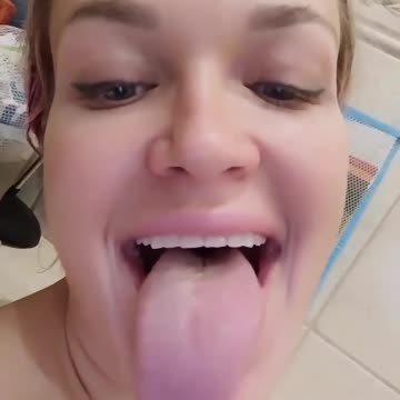 mega long tongue of an attractive girl