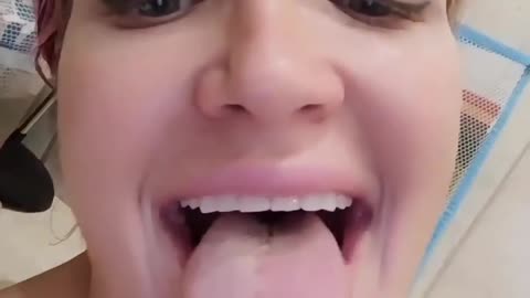 mega long tongue of an attractive girl