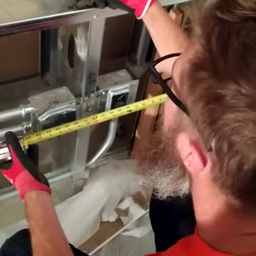 Ryan measured for panel placement.