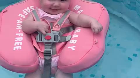 Baby Raises Eyebrow in pool