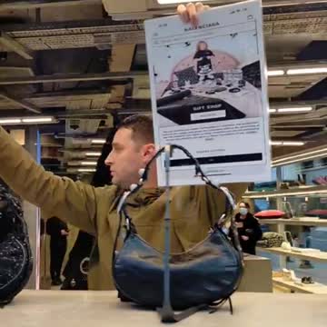 Tommy Robinson and his team flash demo at Balenciaga on New Bond Street, central London.