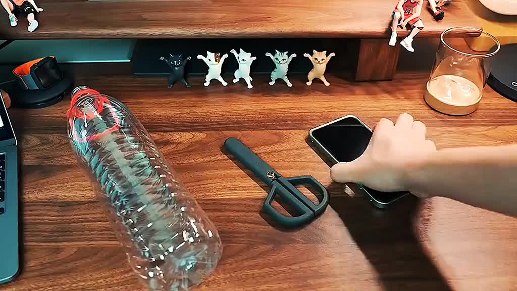 Manufacturing holographic projection with beverage bottles