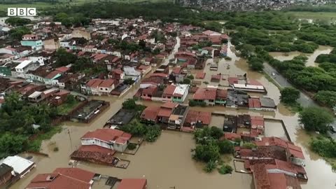 Dams burst in Brazil as deadly flooding continues - BBC News