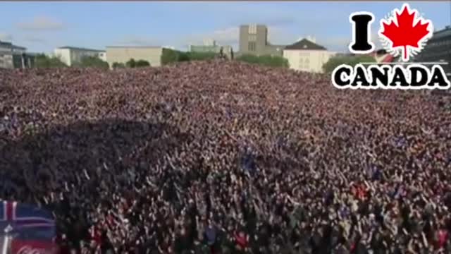 Canadian Freedom Convoy-Thousands of people in square clapping in unison