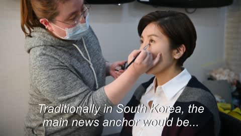 Breaking news and barriers: South Korea's first female anchor | AFP