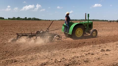 John Deere D plowing