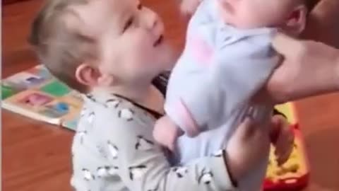 Funny Baby seating and a bully playing