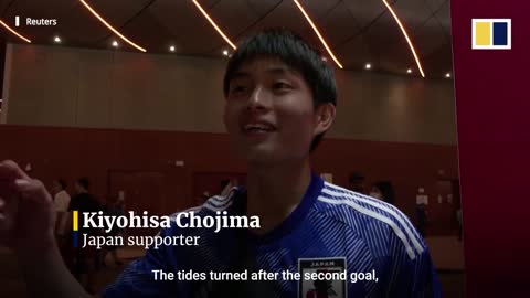 Japanese fans celebrate their team’s stunning World Cup upset victory over Germany