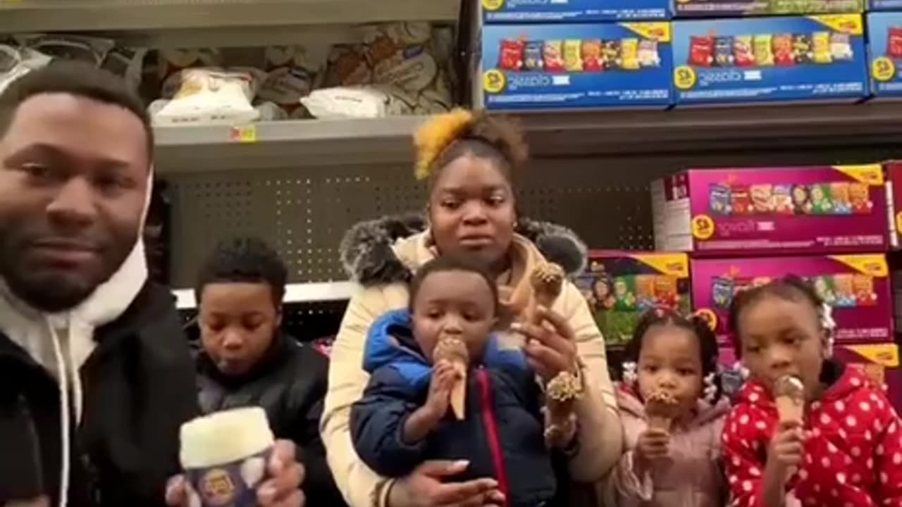 Idiot Black Father Eats Snacks Off The Floor Of A Grocery Store With His Baby Mom & Children!