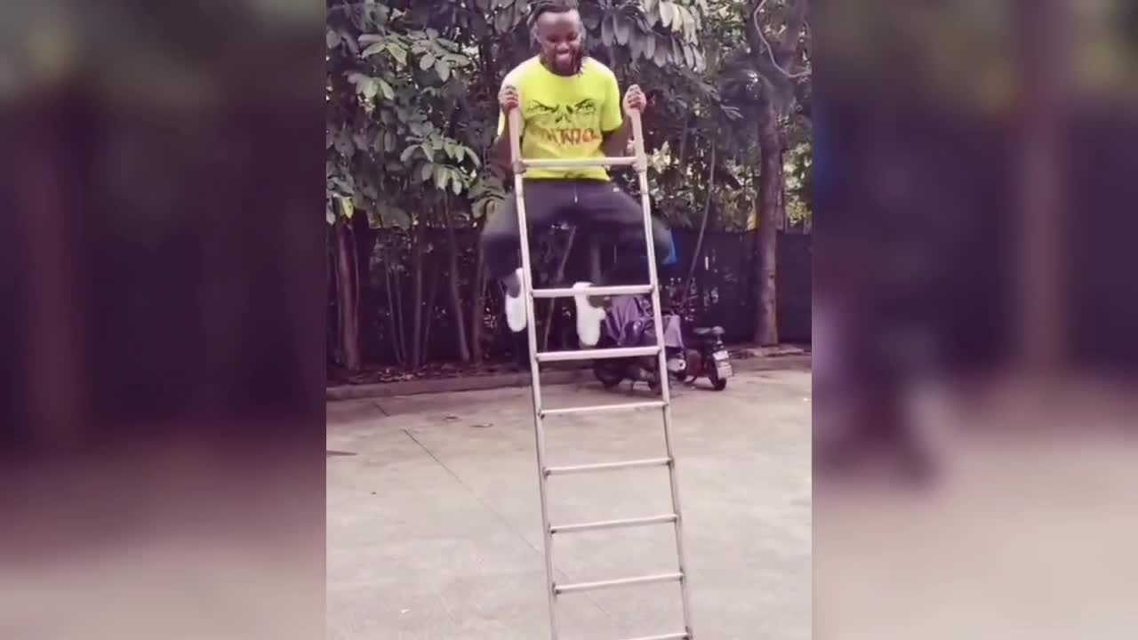 Boys do tricks, ladder also help