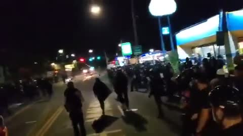 Idiot Fuck Antifa Tries To Stop A Truck With A Motorcycle