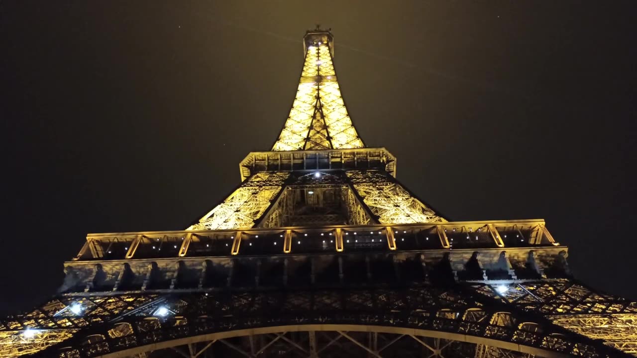 Time lapse_ Lights On Eiffel Tower At Night