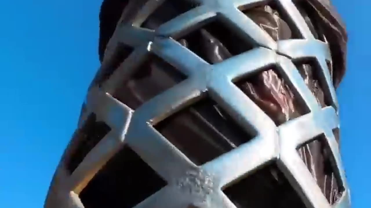 Guy collects trash from the beach