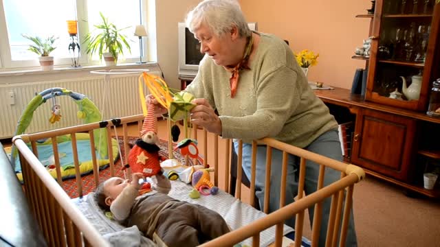 Grandmother with cute granddaughter