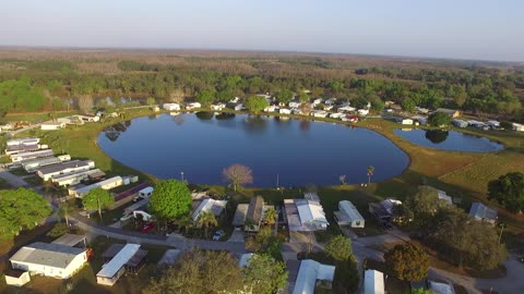 Mobile Homes Around A Lake Drone Footage | 4k Video Ultra Hdr Quality 2023